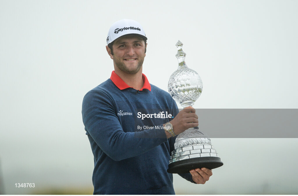9 July 2017; Jon Rahm of Spain with theDubai Duty Free Irish Open trophy on the 18th green on Day 4 of the Dubai Duty Free Irish Open Golf Championship at Portstewart Golf Club in Portstewart, Co Derry. Photo by Oliver McVeigh/Sportsfile