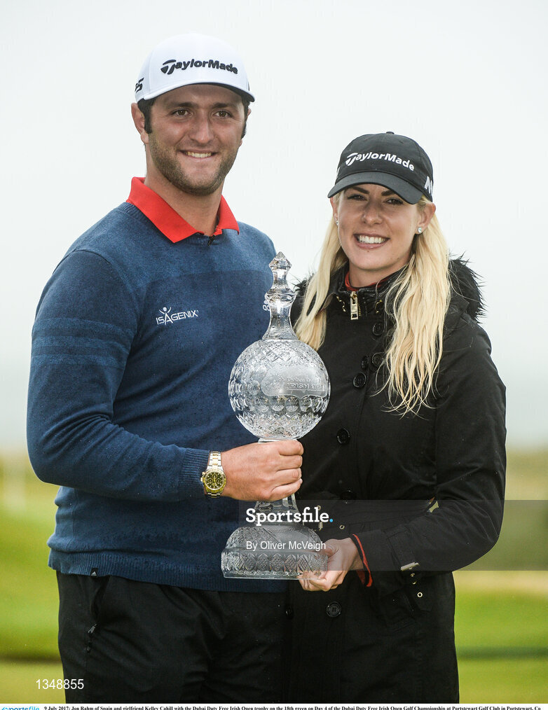 9 July 2017; Jon Rahm of Spain and girlfriend Kelley Cahill with the Dubai Duty Free Irish Open trophy on the 18th green on Day 4 of the Dubai Duty Free Irish Open Golf Championship at Portstewart Golf Club in Portstewart, Co Derry. Photo by Oliver McVeigh/Sportsfile