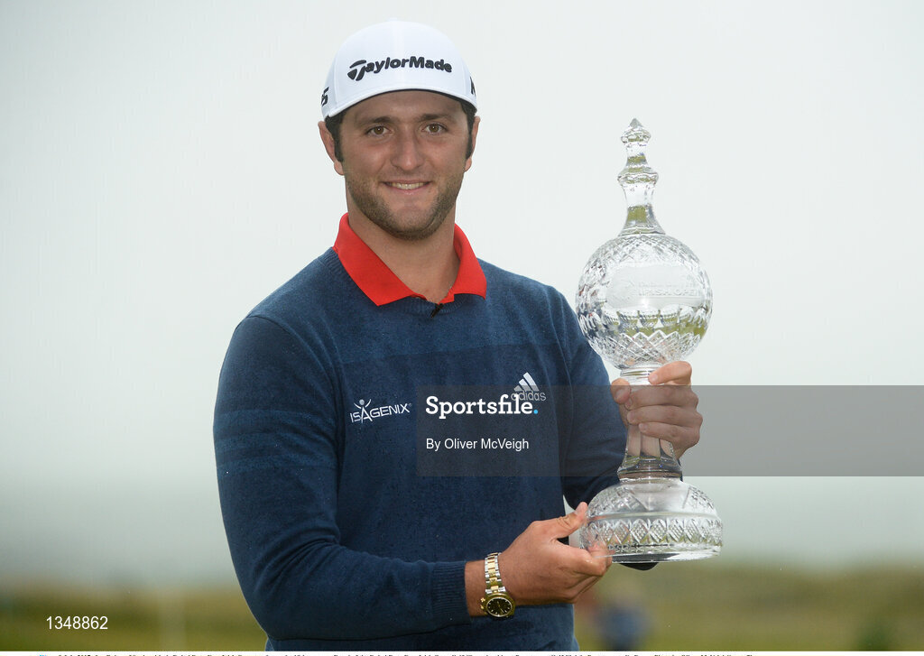 9 July 2017; Jon Rahm of Spain with theDubai Duty Free Irish Open trophy on the 18th green on Day 4 of the Dubai Duty Free Irish Open Golf Championship at Portstewart Golf Club in Portstewart, Co Derry. Photo by Oliver McVeigh/Sportsfile