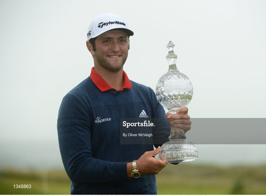 9 July 2017; Jon Rahm of Spain with theDubai Duty Free Irish Open trophy on the 18th green on Day 4 of the Dubai Duty Free Irish Open Golf Championship at Portstewart Golf Club in Portstewart, Co Derry. Photo by Oliver McVeigh/Sportsfile