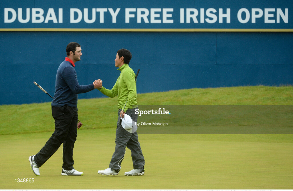 9 July 2017; Jon Rahm of Spain reacts with Daniel Im of USA after winning  the Dubai Duty Free Irish Open on the 18th green on Day 4 of the Dubai Duty Free Irish Open Golf Championship at Portstewart Golf Club in Portstewart, Co Derry. Photo by Oliver McVeigh/Sportsfile