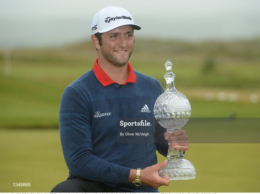 9 July 2017; Jon Rahm of Spain with theDubai Duty Free Irish Open trophy on the 18th green on Day 4 of the Dubai Duty Free Irish Open Golf Championship at Portstewart Golf Club in Portstewart, Co Derry. Photo by Oliver McVeigh/Sportsfile