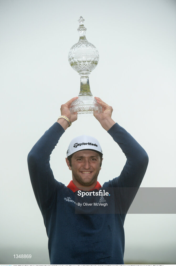 9 July 2017; Jon Rahm of Spain with theDubai Duty Free Irish Open trophy on the 18th green on Day 4 of the Dubai Duty Free Irish Open Golf Championship at Portstewart Golf Club in Portstewart, Co Derry. Photo by Oliver McVeigh/Sportsfile