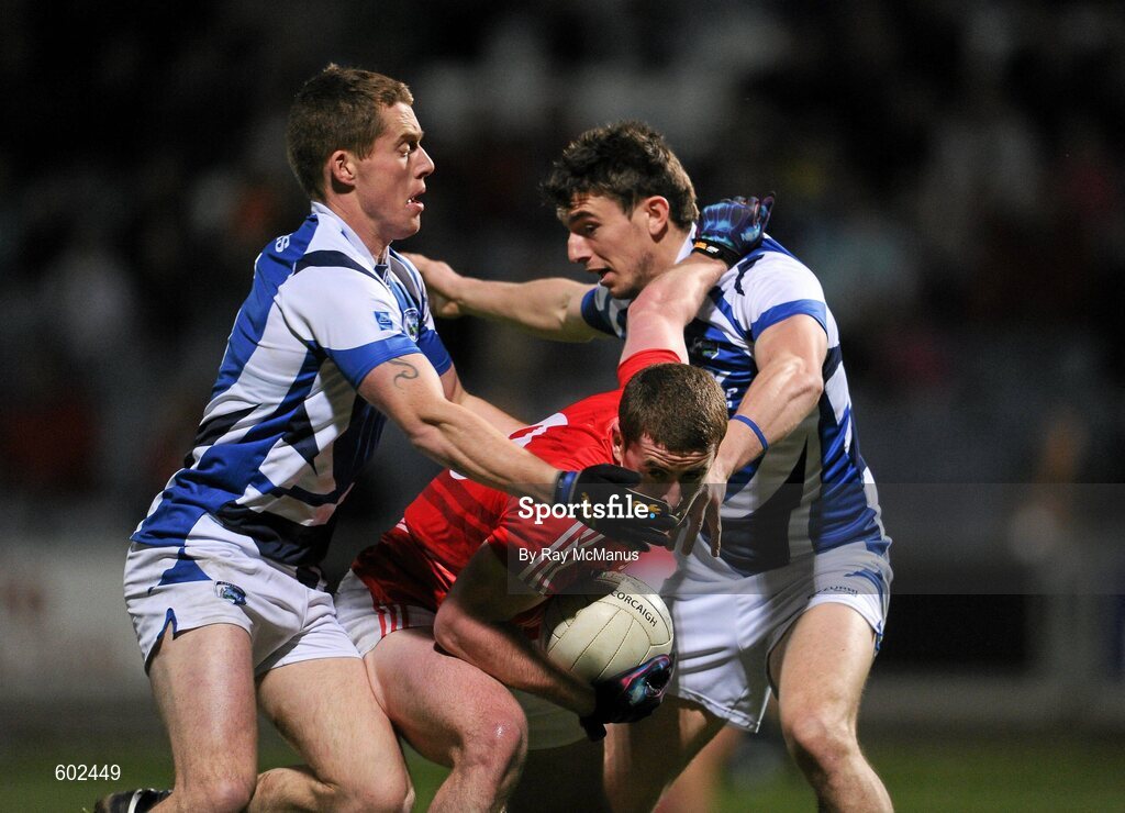10 March 2012; Fintan Goold, Cork, in action against Darren Strong, left, and Colm Begley, Laois. Allianz Football League, Division 1, Round 4, Laois v Cork, O'Moore Park, Portlaoise, Co. Laois. Picture credit: Ray McManus / SPORTSFILE