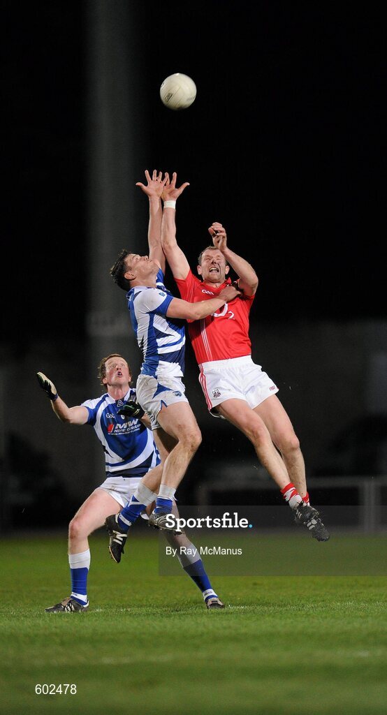 10 March 2012; Alan O'Connor, Cork, in action against John O'Loughlin and Kevin Meaney, left, Laois. Allianz Football League, Division 1, Round 4, Laois v Cork, O'Moore Park, Portlaoise, Co. Laois. Picture credit: Ray McManus / SPORTSFILE