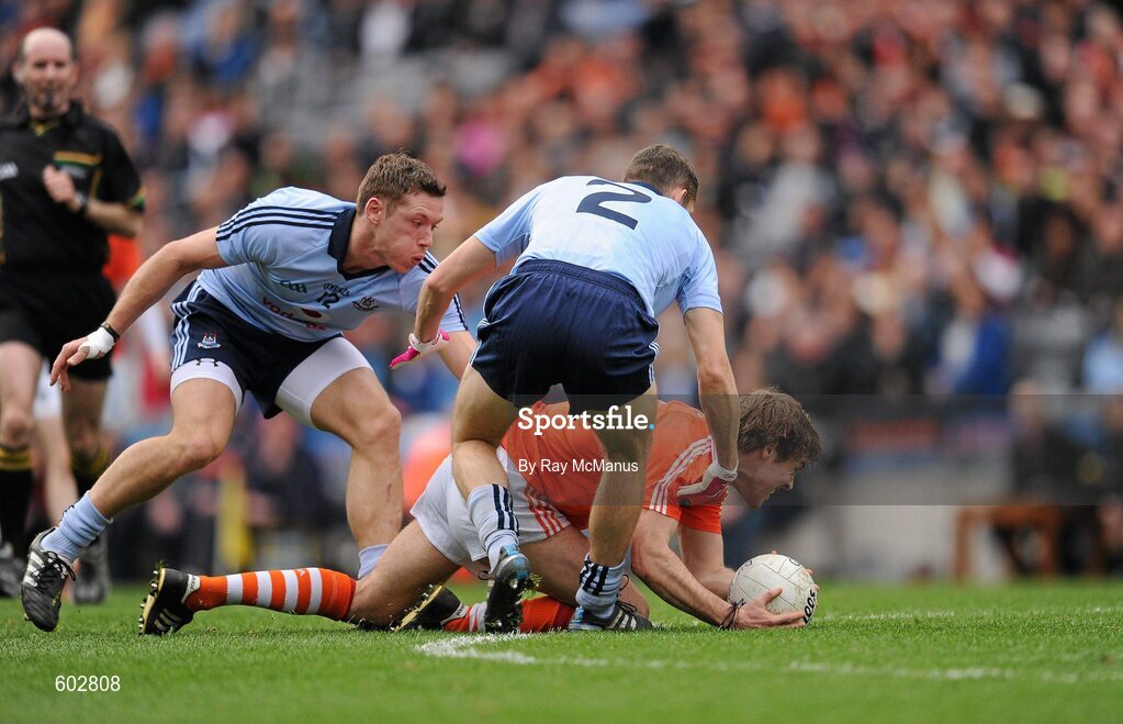11 March 2012; Kevin Dyas, Armagh, in action against Darren Daly, 2, and Paul Flynn, Dublin. Allianz Football League Division 1, Round 4, Dublin v Armagh, Croke Park, Dublin. Picture credit: Ray McManus / SPORTSFILE
