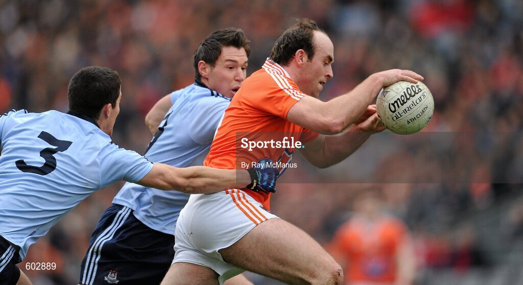 11 March 2012; Malachy Macklin, Armagh, in action against Rory O'Carroll, left, and Eamon Fennell, Dublin. Allianz Football League Division 1, Round 4, Dublin v Armagh, Croke Park, Dublin. Picture credit: Ray McManus / SPORTSFILE