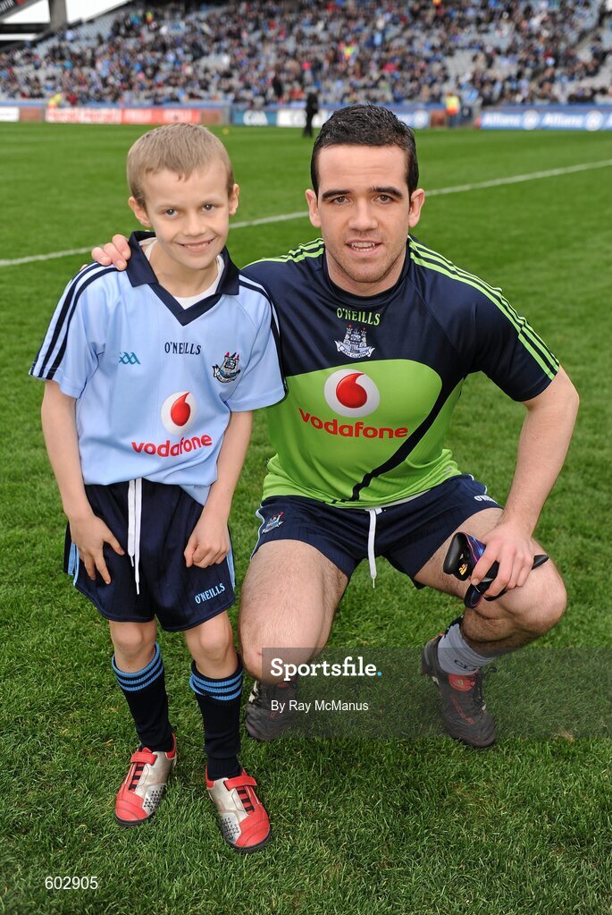 11 March 2012; Dublin captain Ger Brennan poses with eight year old Jack Murphy, from Swords, before the start of the game. Jack was a special guest of the Dublin County Board at the game. Allianz Football League Division 1, Round 4, Dublin v Armagh, Croke Park, Dublin. Picture credit: Ray McManus / SPORTSFILE
