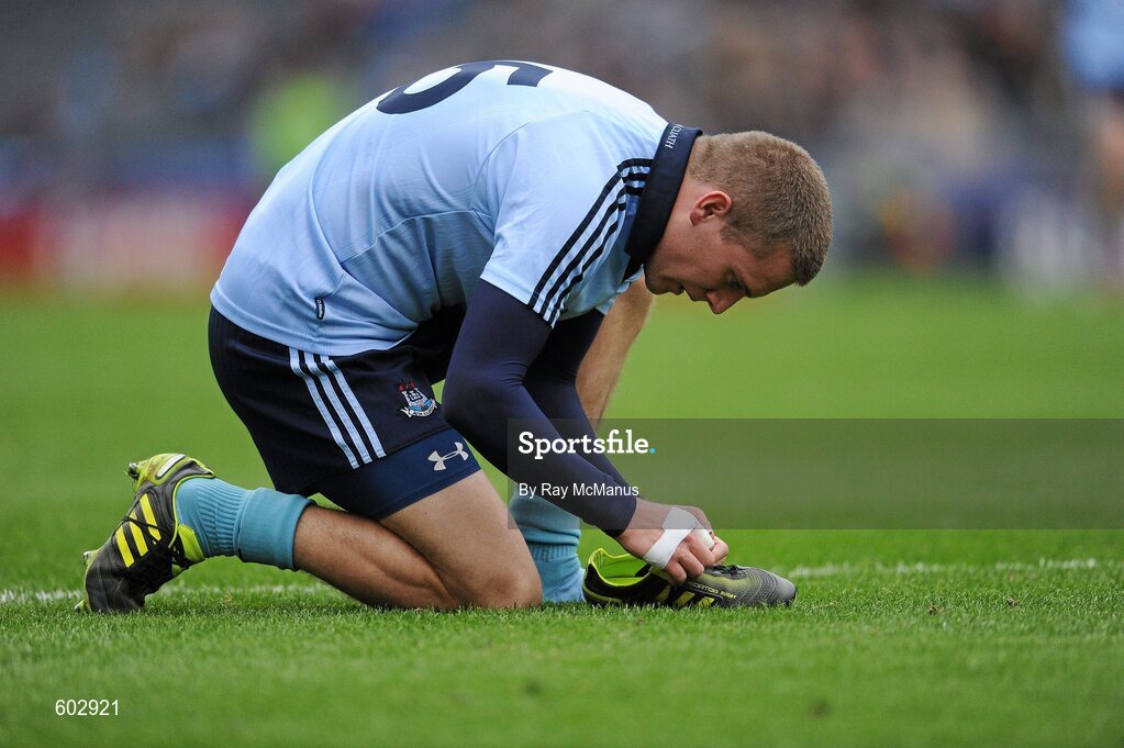 11 March 2012; Dublin corner forward Tomas Quinn adjusts his boots. Allianz Football League Division 1, Round 4, Dublin v Armagh, Croke Park, Dublin. Picture credit: Ray McManus / SPORTSFILE