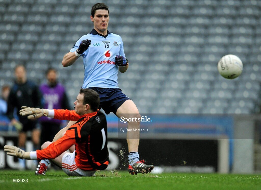 11 March 2012; Diarmuid Connolly shoots past the Armagh goalkeeper, Philip McEvoy, to score the fourth Dublin goal. Allianz Football League Division 1, Round 4, Dublin v Armagh, Croke Park, Dublin. Picture credit: Ray McManus / SPORTSFILE
