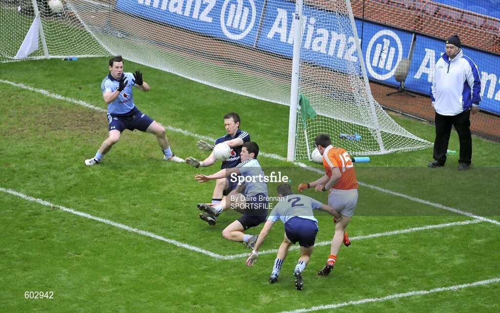 11 March 2012; The Dublin goalkeeper Michael Savage, and full back line of Philip McMahon, left, Rory O'Carroll, and Darren Daly, right, block a shot from Gavin McParland, Armagh. Allianz Football League Division 1, Round 4, Dublin v Armagh, Croke Park, Dublin. Picture credit: Daire Brennan / SPORTSFILE