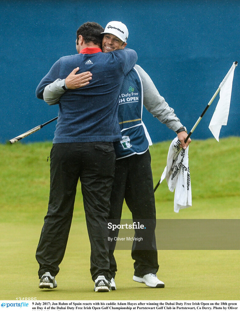 9 July 2017; Jon Rahm of Spain reacts with his caddie Adam Hayes after winning the Dubai Duty Free Irish Open on the 18th green on Day 4 of the Dubai Duty Free Irish Open Golf Championship at Portstewart Golf Club in Portstewart, Co Derry. Photo by Oliver McVeigh/Sportsfile