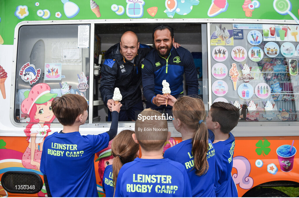 11 July 2017; Richardt Strauss, left, and Isa Nacewa serve ice cream to young players during the Bank of Ireland Leinster Rugby Summer Camp at Balbriggan RFC in Dublin. Photo by Eóin Noonan/Sportsfile