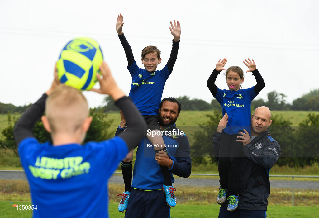 11 July 2017; Isa Nacewa and Richardt Strauss with young players Conor McFadden, age 10, from Balbriggan, Co. Dublin, and Tara Hickey, age 9, from Balbriggan, Co. Dublin, in action during the Bank of Ireland Leinster Rugby Summer Camp at Balbriggan RFC in Dublin. Photo by Eóin Noonan/Sportsfile