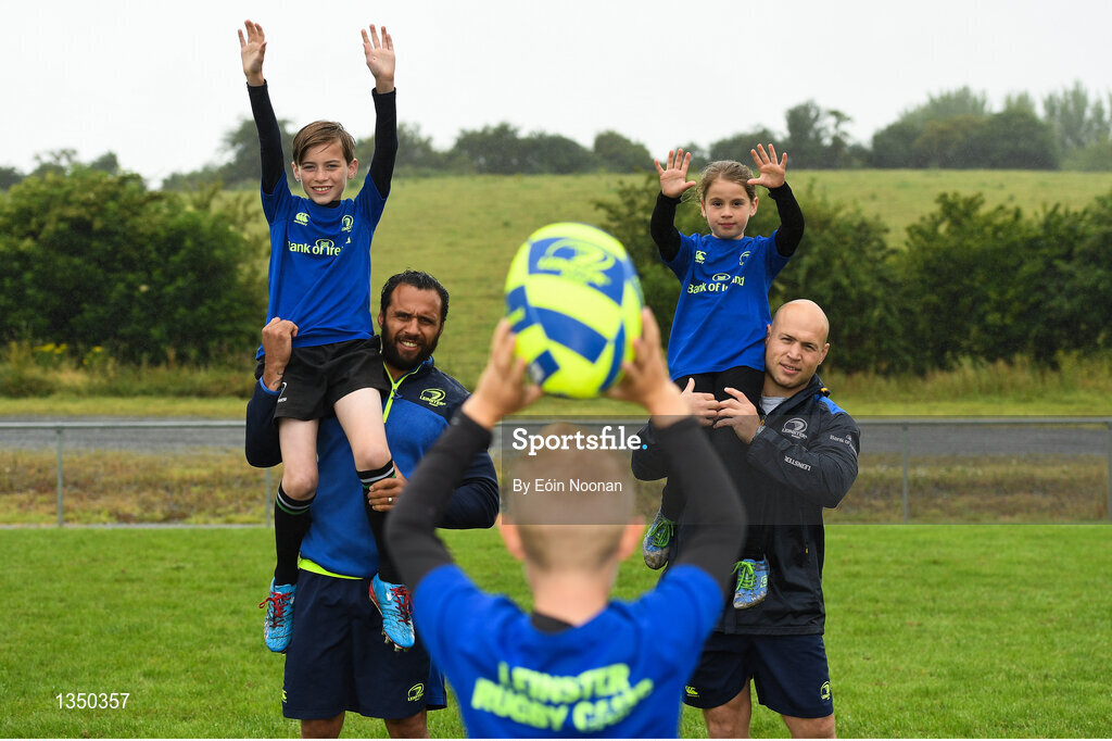 11 July 2017; Isa Nacewa and Richardt Strauss with young players Conor McFadden, age 10, from Balbriggan, Co. Dublin, and Tara Hickey, age 9, from Balbriggan, Co. Dublin, in action during the Bank of Ireland Leinster Rugby Summer Camp at Balbriggan RFC in Dublin. Photo by Eóin Noonan/Sportsfile