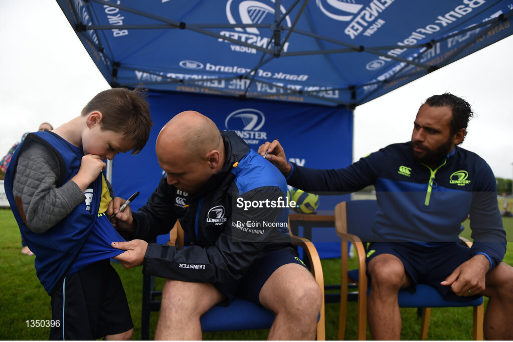 11 July 2017; Richardt Strauss, left and Isa Nacewa sign autographs for young players during the Bank of Ireland Leinster Rugby Summer Camp at Balbriggan RFC in Dublin. Photo by Eóin Noonan/Sportsfile