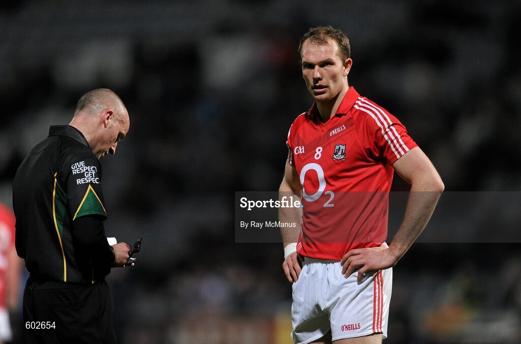 10 March 2012; Referee Cormac Reilly notes the name of Alan O'Connor, Cork, before issuing him a 'yellow card'. Allianz Football League, Division 1, Round 4, Laois v Cork, O'Moore Park, Portlaoise, Co. Laois. Picture credit: Ray McManus / SPORTSFILE
