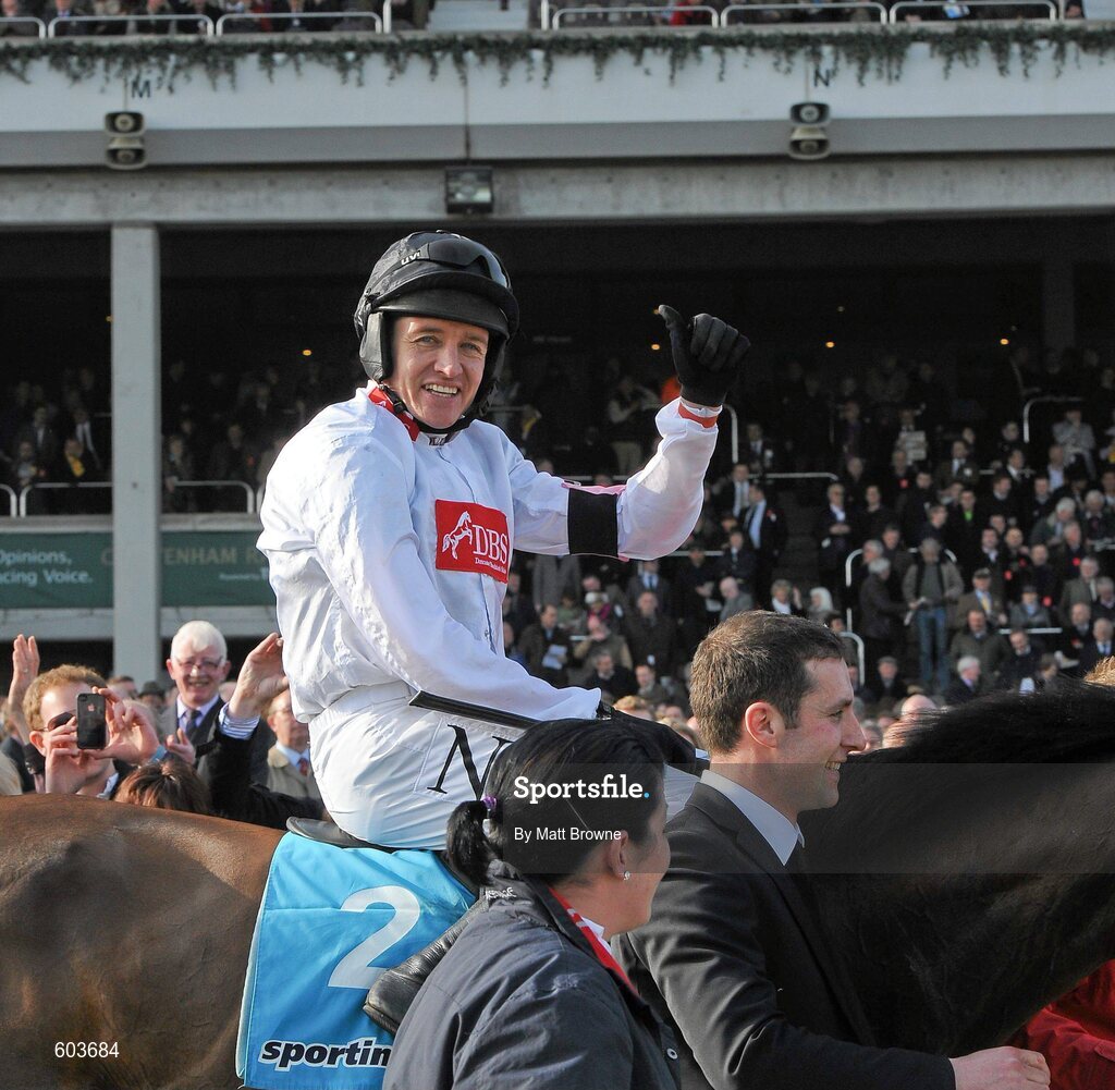 14 March 2012; Barry Geraghty, aboard Finian's Rainbow, celebrates after winning the sportingbet.com Queen Mother Champion Steeple Chase. Cheltenham Racing Festival, Prestbury Park, Cheltenham, England. Picture credit: Matt Browne / SPORTSFILE