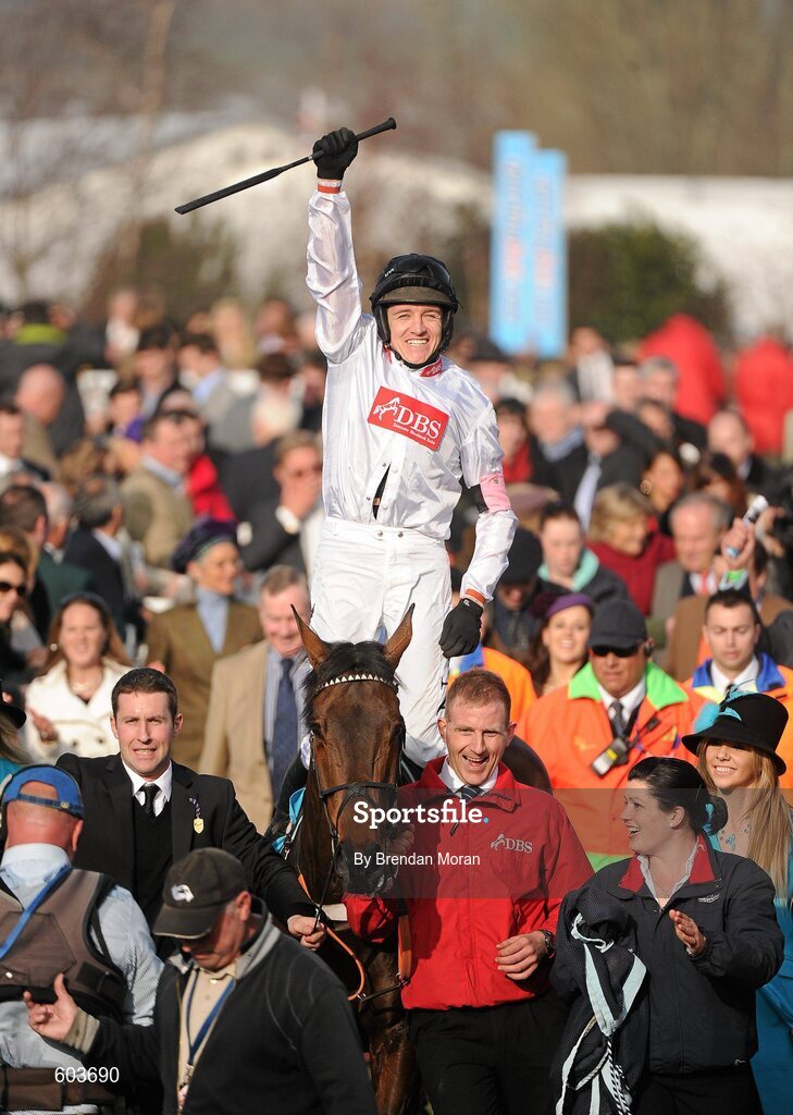 14 March 2012; Jockey Barry Geraghty, aboard Finian's Rainbow, celebrates after winning the sportingbet.com Queen Mother Champion Steeple Chase. Cheltenham Racing Festival, Prestbury Park, Cheltenham, England. Picture credit: Brendan Moran / SPORTSFILE