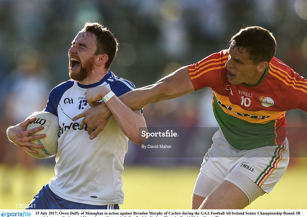15 July 2017; Owen Duffy of Monaghan in action against Brendan Murphy of Carlow during the GAA Football All-Ireland Senior Championship Round 3B match between Carlow and Monaghan at Netwatch Cullen Park in Carlow. Photo by David Maher/Sportsfile