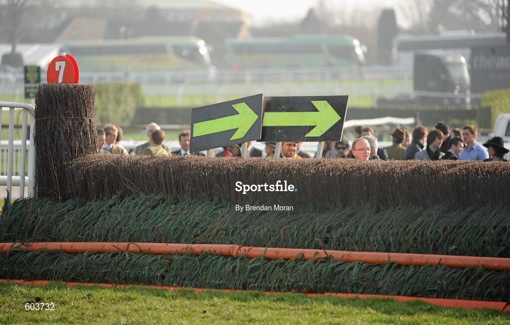 14 March 2012; Signs are erected on the last fence instructing the riders to avoid it after jockey Richard Johnson was unseated by his mount Wishful Thinking as they jumped the 'last first time round' during the sportingbet.com Queen Mother Champion Steeple Chase. Cheltenham Racing Festival, Prestbury Park, Cheltenham, England. Picture credit: Brendan Moran / SPORTSFILE