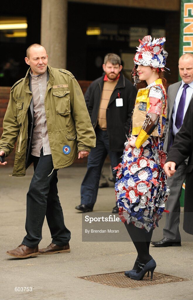 14 March 2012; A dress made of crisps packets get some looks during Ladies Day at the Cheltenham Festival. Cheltenham Racing Festival, Prestbury Park, Cheltenham, England. Picture credit: Brendan Moran / SPORTSFILE