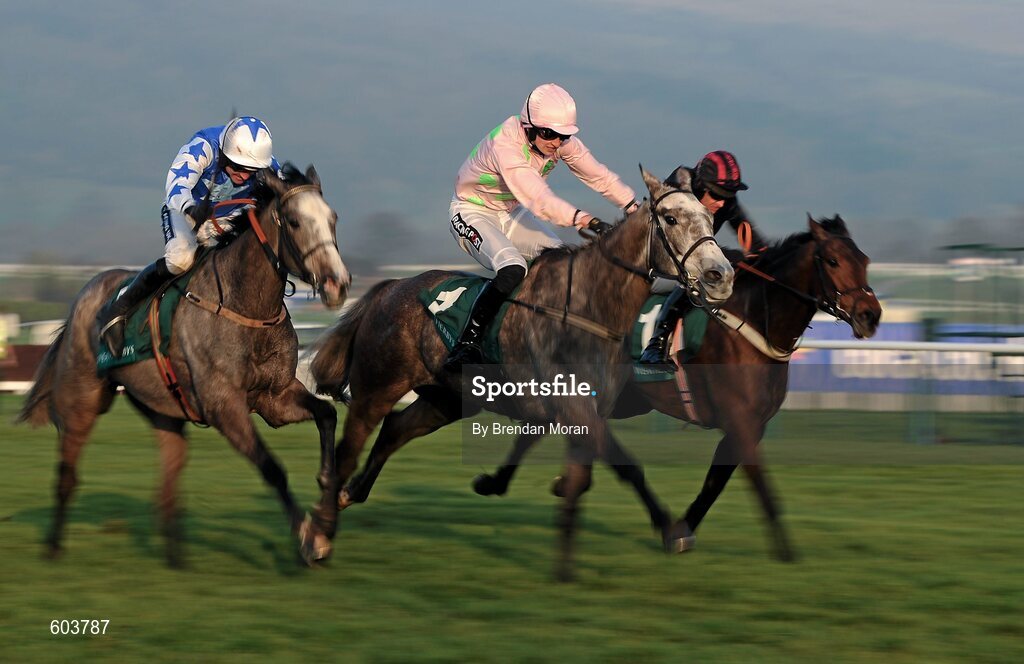 14 March 2012; Champagne Fever, centre, with Patrick Mullins up, leads eventual second The New One, with Sam Twiston-Davies up, and eventual third Pique Sous, with Ruby Walsh up, on their way to winning the Weatherbys Champion Bumper. Cheltenham Racing Festival, Prestbury Park, Cheltenham, England. Picture credit: Brendan Moran / SPORTSFILE