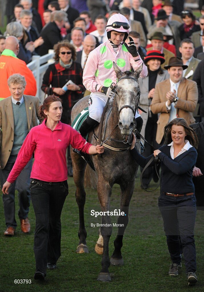 14 March 2012; Jockey Patrick Mullins, aboard Champagne Fever, acknowledges the crowd's applause after winning the Weatherbys Champion Bumper. Cheltenham Racing Festival, Prestbury Park, Cheltenham, England. Picture credit: Brendan Moran / SPORTSFILE
