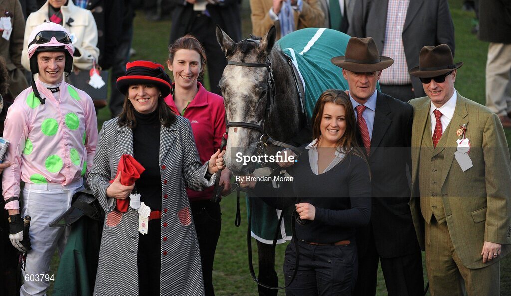 14 March 2012; Winning connections, including jockey Patrick Mullins, trainer Willie Mullins, second from right, with Champagne Fever after winning the Weatherbys Champion Bumper. Cheltenham Racing Festival, Prestbury Park, Cheltenham, England. Picture credit: Brendan Moran / SPORTSFILE