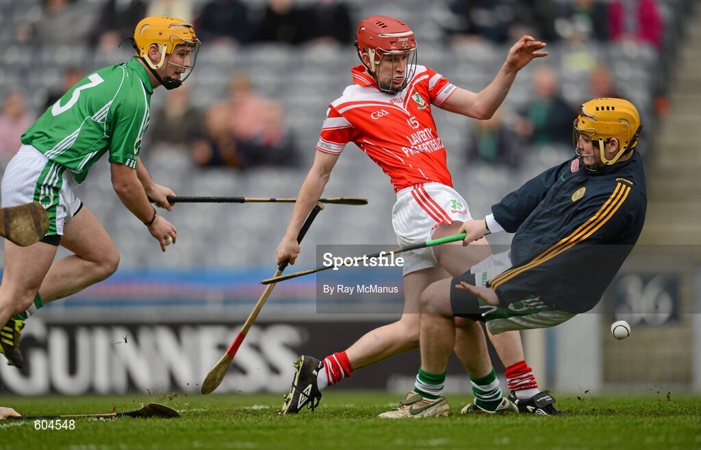 17 March 2012; Coolderry players Trevor Corcoran and goalkeeper Stephen Corcoran fail to prevent Shay Casey scoring the first goal for Loughgiel Shamrocks. AIB GAA Hurling All-Ireland Senior Club Championship Final, Coolderry, Offaly, v Loughgiel Shamrocks, Antrim, Croke Park, Dublin. Picture credit: Ray McManus / SPORTSFILE