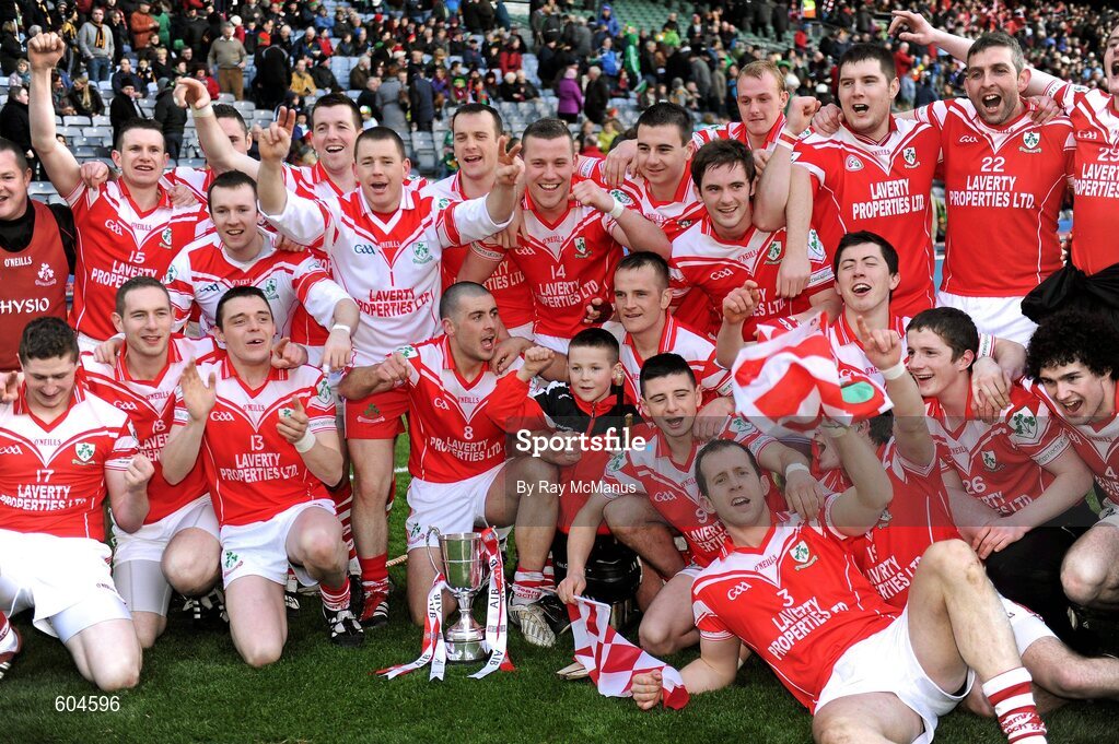 17 March 2012; Members of the Loughgiel Shamrocks squad celebrate with the Tommy Moore Cup. AIB GAA Hurling All-Ireland Senior Club Championship Final, Coolderry, Offaly, v Loughgiel Shamrocks, Antrim, Croke Park, Dublin. Picture credit: Ray McManus / SPORTSFILE