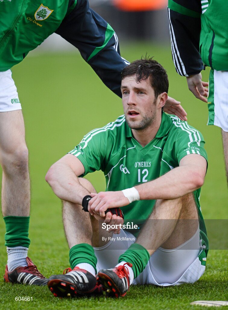 17 March 2012; Cathal Parlon is comforted by his Coolderry team mates. AIB GAA Hurling All-Ireland Senior Club Championship Final, Coolderry, Offaly, v Loughgiel Shamrocks, Antrim, Croke Park, Dublin. Picture credit: Ray McManus / SPORTSFILE