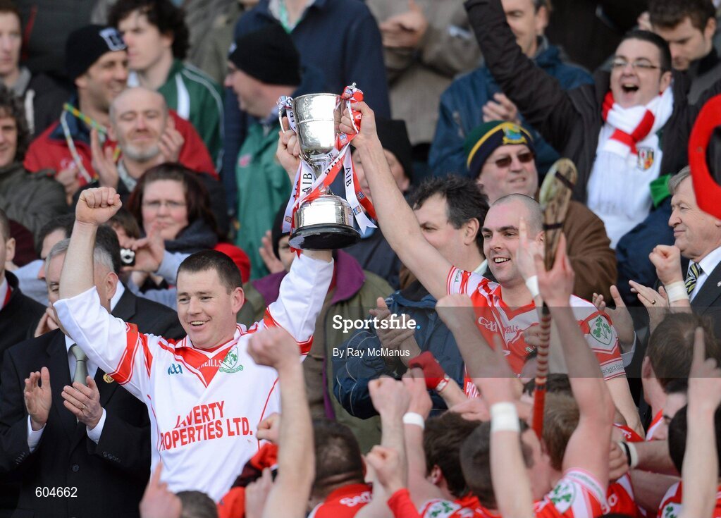 17 March 2012; Loughgiel Shamrocks joint captains Damian Quinn, left, and Johnny Campbell lift the Tommy Moore Cup. AIB GAA Hurling All-Ireland Senior Club Championship Final, Coolderry, Offaly, v Loughgiel Shamrocks, Antrim, Croke Park, Dublin. Picture credit: Ray McManus / SPORTSFILE