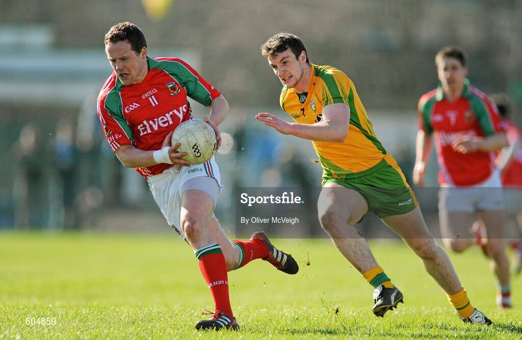 18 March 2012; Andy Moran, Mayo, in action against Leo McLoone, Donegal. Allianz Football League, Division 1, Round 5, Donegal v Mayo, Fr. Tierney Park, Ballyshannon, Donegal. Picture credit: Oliver McVeigh / SPORTSFILE