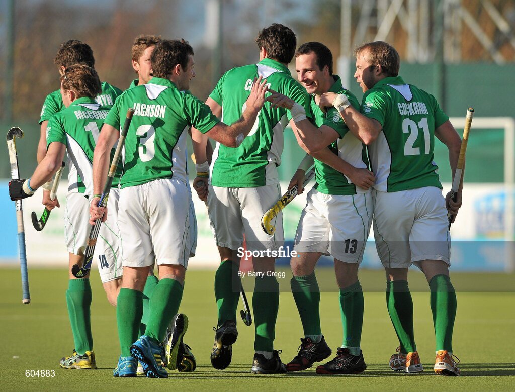 18 March 2012; Peter Caruth, second from right, Ireland, celebrates with team-mates Timothy Cockram, right, Christopher Cargo, left, and John Jackson, fourth from right, after scoring his side's first goal of the game. Men’s 2012 Olympic Qualifying Tournament, Ireland v Malaysia, National Hockey Stadium, UCD, Belfield, Dublin. Picture credit: Barry Cregg / SPORTSFILE
