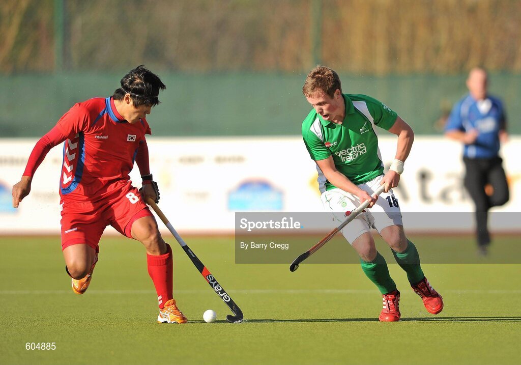 18 March 2012; Ian Sloan, Ireland, in action against Seung II Lee, Korea. Men’s 2012 Olympic Qualifying Tournament Final, Ireland v Korea. National Hockey Stadium, UCD, Belfield, Dublin. Picture credit: Barry Cregg / SPORTSFILE