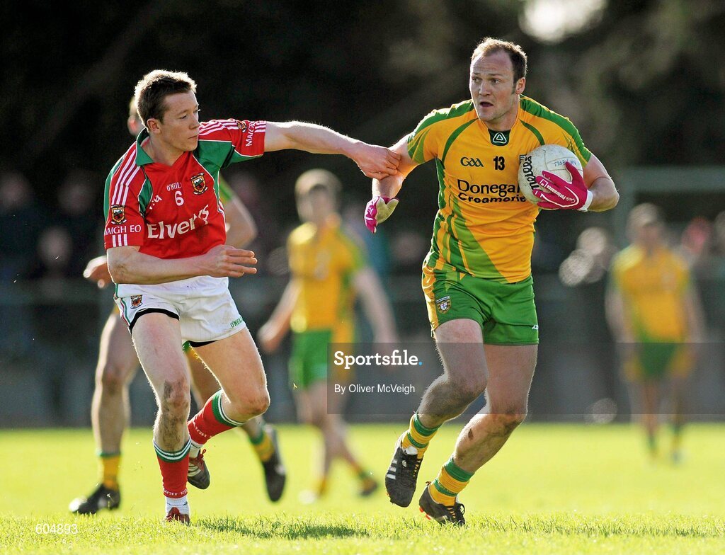 18 March 2012; Colm McFadden, Donegal, in action against Donal Vaughan, Mayo. Allianz Football League, Division 1, Round 5, Donegal v Mayo, Fr. Tierney Park, Ballyshannon, Donegal. Picture credit: Oliver McVeigh / SPORTSFILE