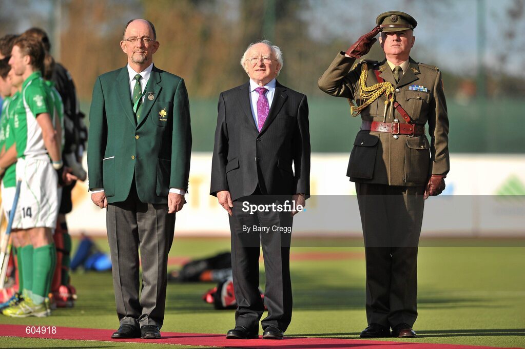 18 March 2012; President of Ireland Michael D. Higgins stands alongside Herbie Sharman, left, President, Irish Hockey Association, and Defence Forces Chief of Staff Lieutenant General Seán McCann during the National Anthem before the game. Men’s 2012 Olympic Qualifying Tournament Final, Ireland v Korea. National Hockey Stadium, UCD, Belfield, Dublin. Picture credit: Barry Cregg / SPORTSFILE