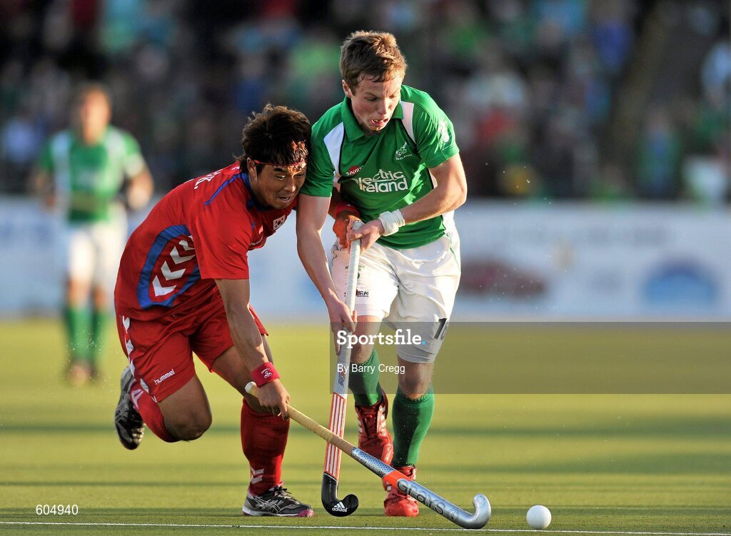 18 March 2012; Ian Sloan, Ireland, in action against Dae Keun Oh, Korea. Men’s 2012 Olympic Qualifying Tournament Final, Ireland v Korea. National Hockey Stadium, UCD, Belfield, Dublin. Picture credit: Barry Cregg / SPORTSFILE