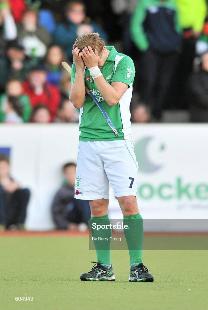 18 March 2012; A dejected Michael Watt, Ireland, after the game. Men’s 2012 Olympic Qualifying Tournament Final, Ireland v Korea. National Hockey Stadium, UCD, Belfield, Dublin. Picture credit: Barry Cregg / SPORTSFILE