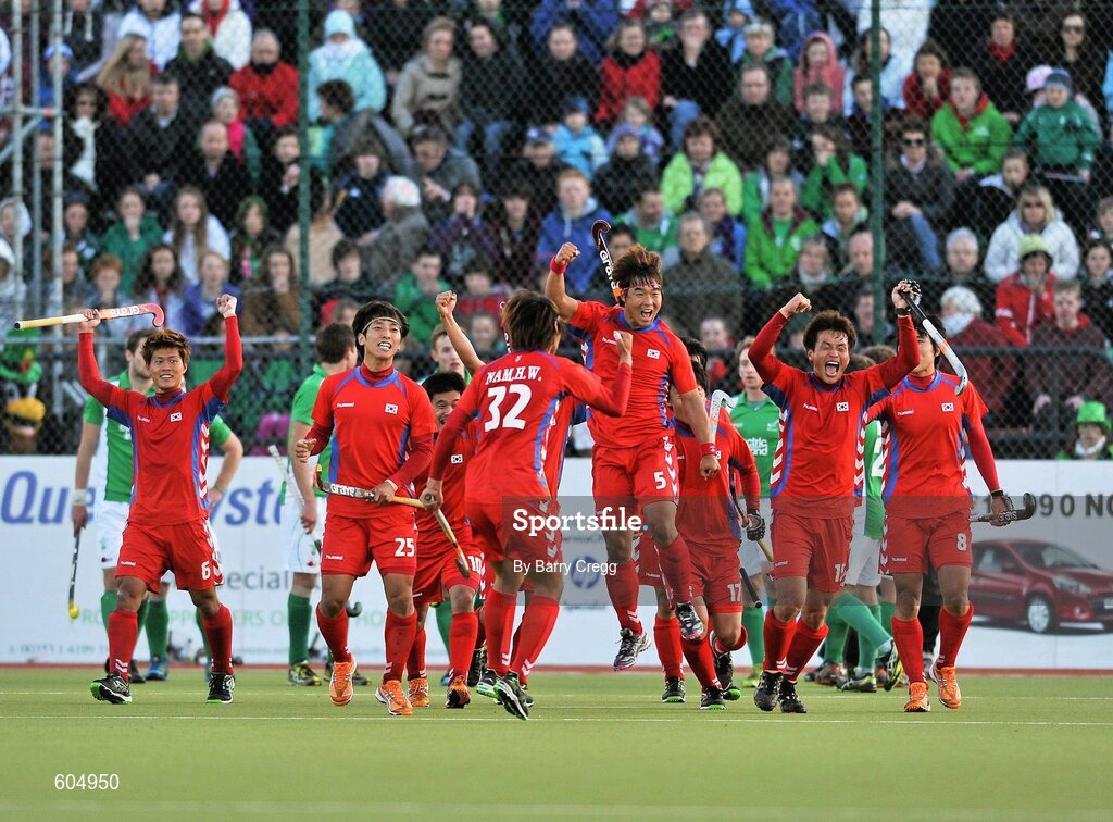 18 March 2012; Korea players celebrate after they scored a goal tin the final seconds of the game. Men’s 2012 Olympic Qualifying Tournament Final, Ireland v Korea. National Hockey Stadium, UCD, Belfield, Dublin. Picture credit: Barry Cregg / SPORTSFILE