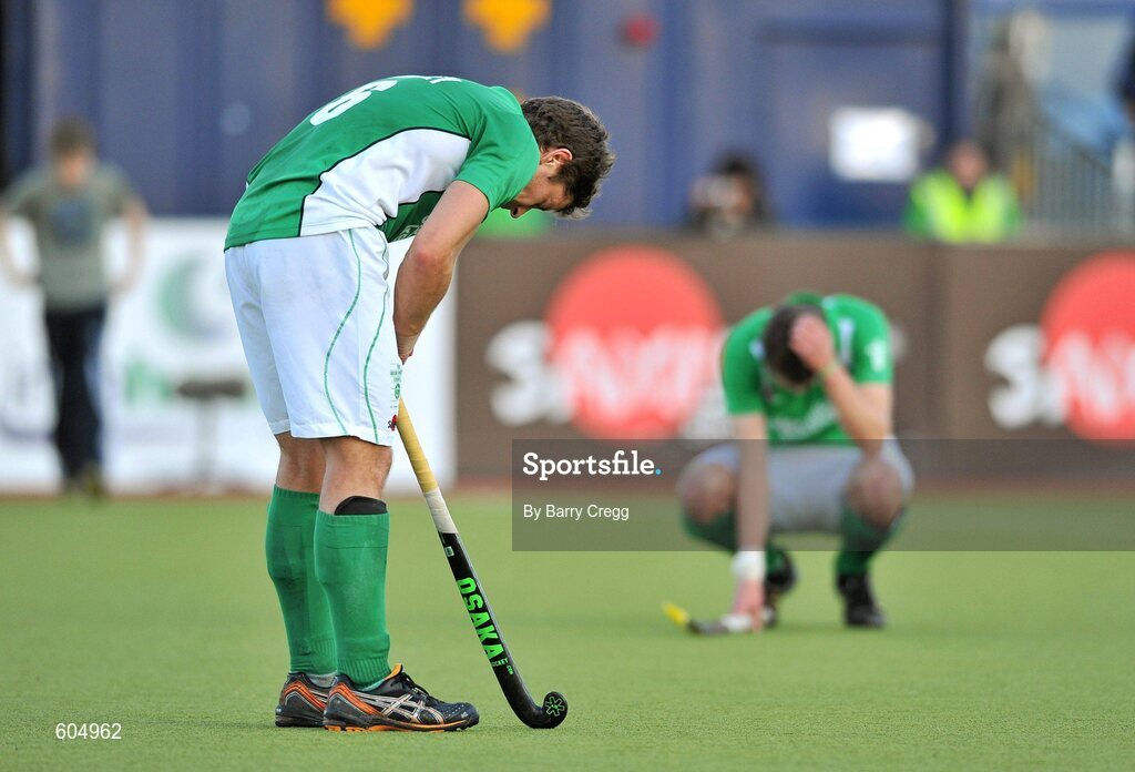 18 March 2012; A dejected Ireland captain Ronan Gormley, left, and William Geoffrey McCabe, right, after the game. Men’s 2012 Olympic Qualifying Tournament Final, Ireland v Korea. National Hockey Stadium, UCD, Belfield, Dublin. Picture credit: Barry Cregg / SPORTSFILE