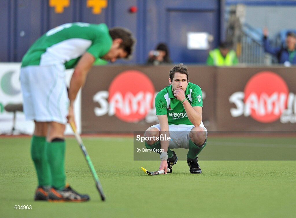 18 March 2012; A dejected William Geoffrey McCabe, right, Ireland, and team captain Ronan Gormley, left, after the game. Men’s 2012 Olympic Qualifying Tournament Final, Ireland v Korea. National Hockey Stadium, UCD, Belfield, Dublin. Picture credit: Barry Cregg / SPORTSFILE