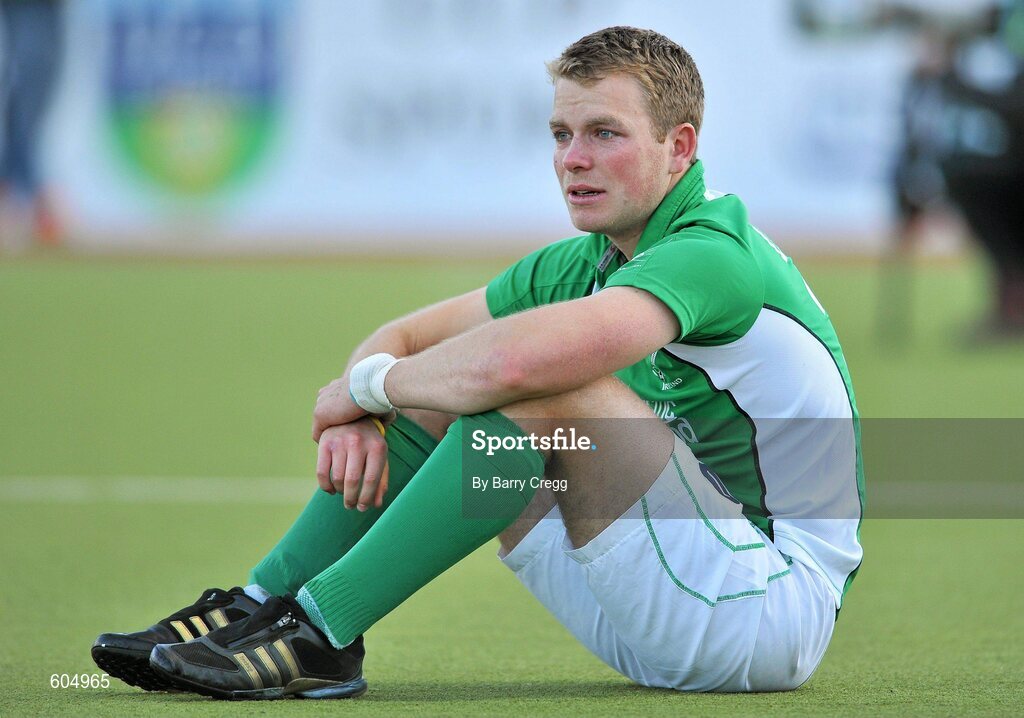 18 March 2012; A dejected Stuart Loughrey, Ireland, after the game. Men’s 2012 Olympic Qualifying Tournament Final, Ireland v Korea. National Hockey Stadium, UCD, Belfield, Dublin. Picture credit: Barry Cregg / SPORTSFILE
