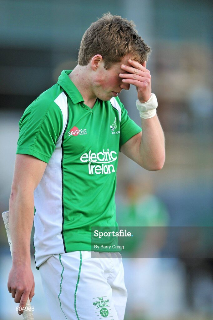 18 March 2012; A dejected Ian Sloan, Ireland, after the game. Men’s 2012 Olympic Qualifying Tournament Final, Ireland v Korea. National Hockey Stadium, UCD, Belfield, Dublin. Picture credit: Barry Cregg / SPORTSFILE