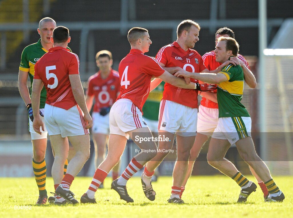 18 March 2012; Darran O'Sullivan, Kerry, tussles with Cork players, from left, Eoin Cotter, Michael Shields and Graham Canty. Allianz Football League, Division 1, Round 5, Cork v Kerry, Pairc Ui Chaoimh, Cork. Picture credit: Stephen McCarthy / SPORTSFILE