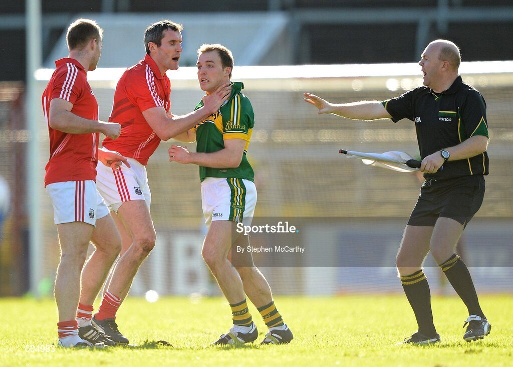 18 March 2012; Darran O'Sullivan, Kerry, during an altercation with Cork players Michael Shields, left, and Graham Canty as linesman Richard Moloney steps in. Allianz Football League, Division 1, Round 5, Cork v Kerry, Pairc Ui Chaoimh, Cork. Picture credit: Stephen McCarthy / SPORTSFILE