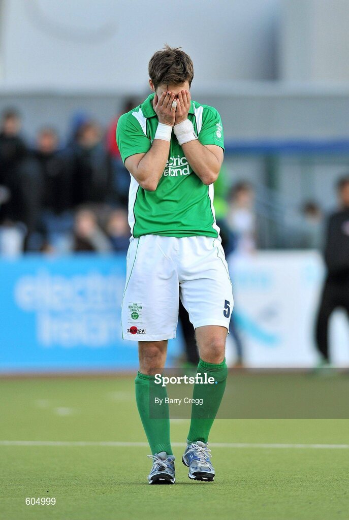 18 March 2012; A dejected William Geoffrey McCabe, Ireland, after the game. Men’s 2012 Olympic Qualifying Tournament Final, Ireland v Korea. National Hockey Stadium, UCD, Belfield, Dublin. Picture credit: Barry Cregg / SPORTSFILE