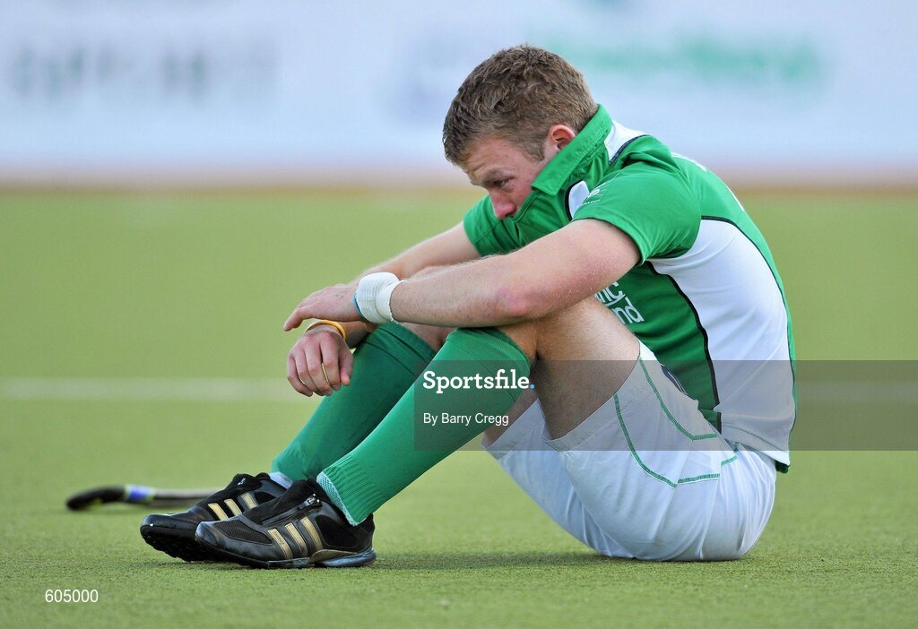 18 March 2012; A dejected Stuart Loughrey, Ireland, after the game. Men’s 2012 Olympic Qualifying Tournament Final, Ireland v Korea. National Hockey Stadium, UCD, Belfield, Dublin. Picture credit: Barry Cregg / SPORTSFILE