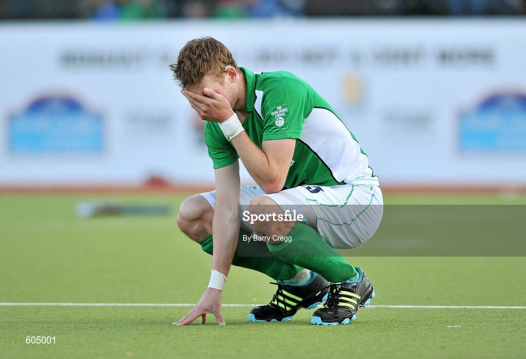18 March 2012; A dejected David Ames, Ireland, after the game. Men’s 2012 Olympic Qualifying Tournament Final, Ireland v Korea. National Hockey Stadium, UCD, Belfield, Dublin. Picture credit: Barry Cregg / SPORTSFILE